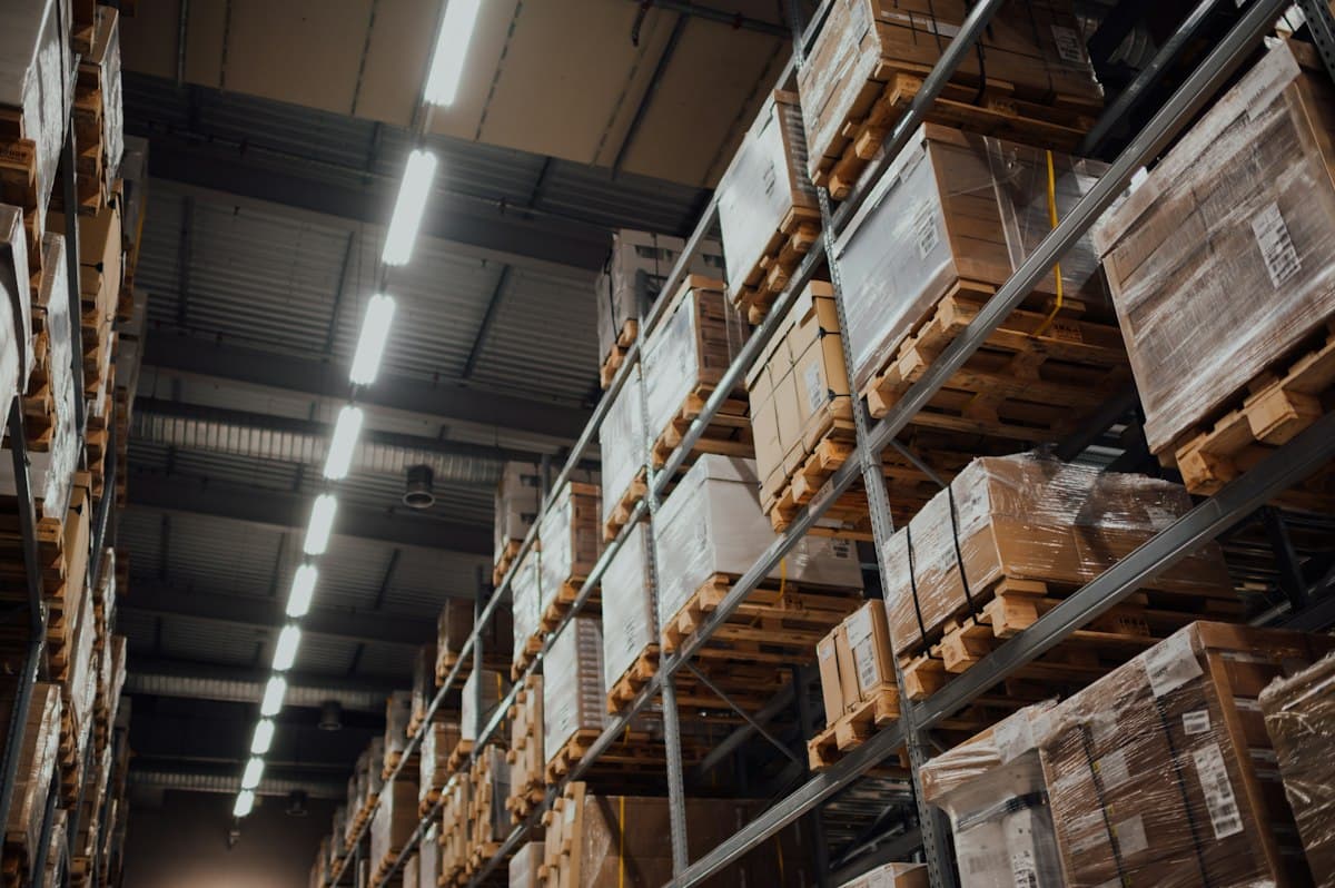 Warehouse shelves stocked with boxed products